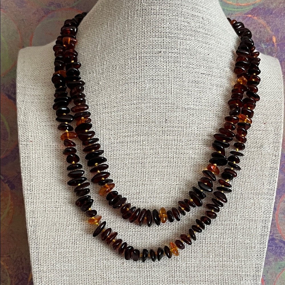 Pretty divided strand small polished Baltic amber nuggets knotted gold thread